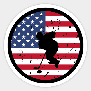 American Flag and Ice Hockey Player Silhouette, A silhouette of an ice hockey player overlaid on a distressed American flag, encapsulating patriotism and sportsmanship. Sticker